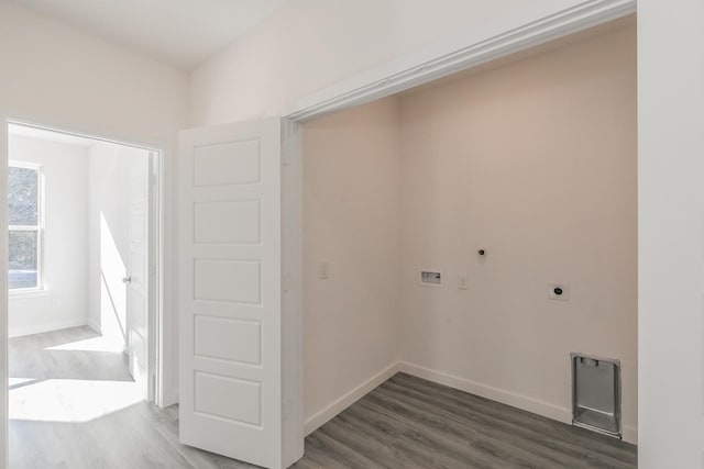 washroom featuring baseboards, washer hookup, electric dryer hookup, and wood finished floors