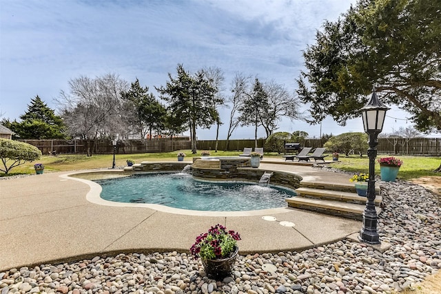 view of swimming pool featuring a patio, a yard, a fenced backyard, and a fenced in pool