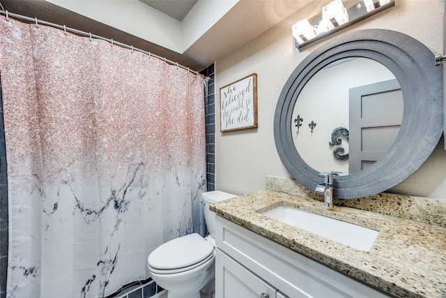 full bath featuring curtained shower, vanity, and toilet