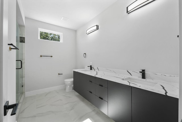 full bath featuring marble finish floor, toilet, a sink, a shower stall, and baseboards