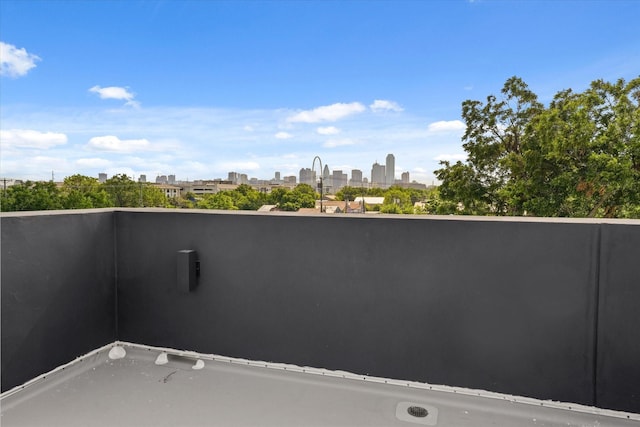 balcony featuring a city view