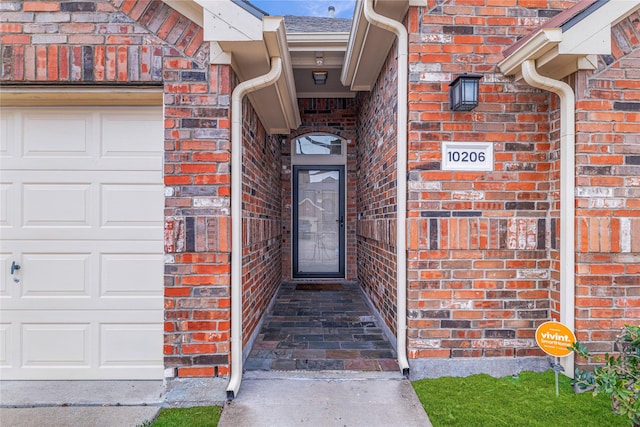 10206 Links Fairway, Rowlett, TX 75089 - entrance to property featuring brick siding and an attached garage