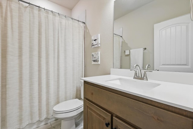 bathroom with a shower with shower curtain, vanity, and toilet