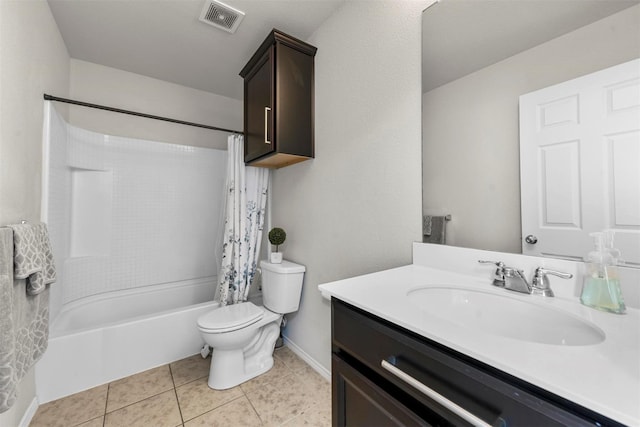 full bathroom with toilet, shower / tub combo, vanity, visible vents, and tile patterned floors