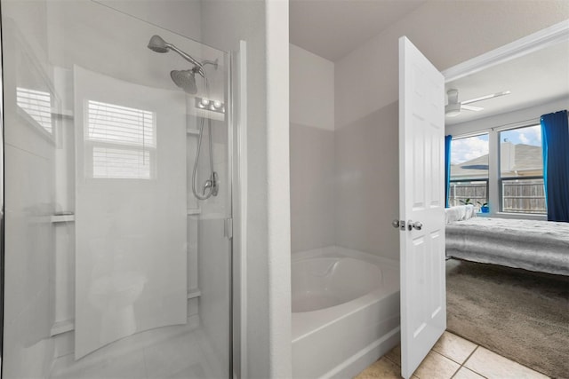 ensuite bathroom featuring a stall shower, a garden tub, ensuite bath, and tile patterned floors