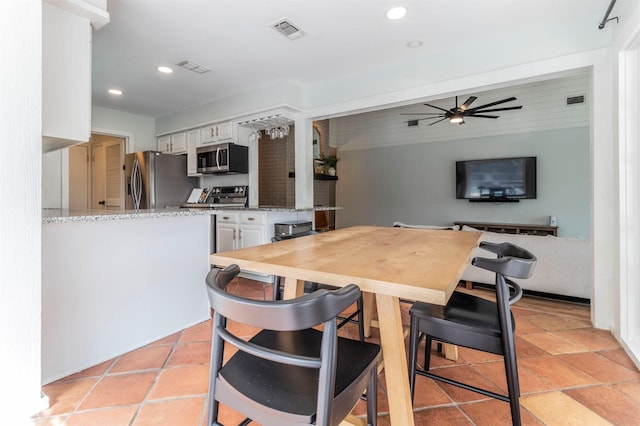 kitchen featuring a ceiling fan, visible vents, recessed lighting, appliances with stainless steel finishes, and white cabinetry