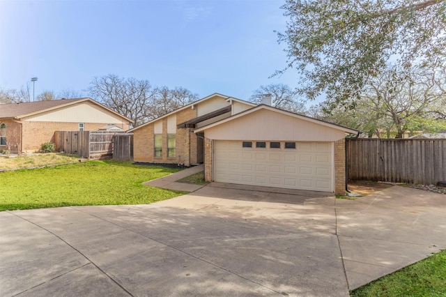 view of front of property with brick siding, a front yard, and fence