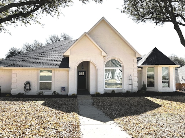 1607 Amesbury Ln, Rockwall, TX 75087 - french provincial home featuring brick siding and a shingled roof