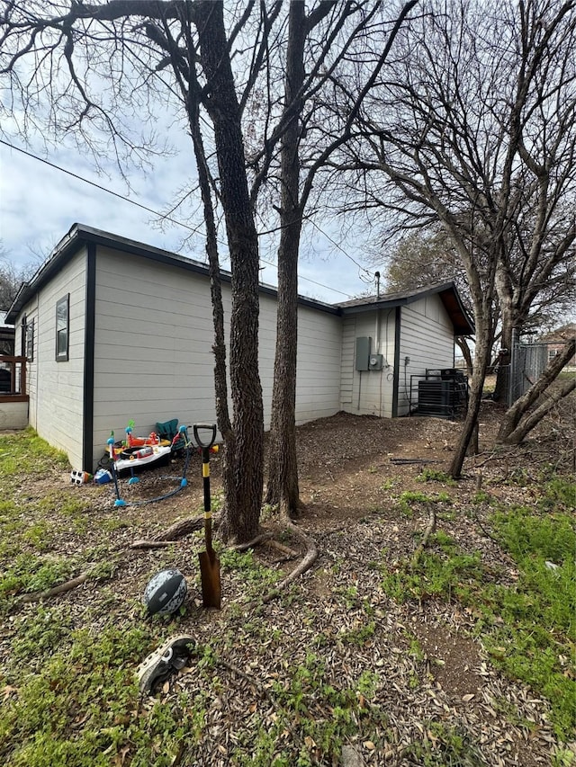 view of home's exterior featuring central air condition unit