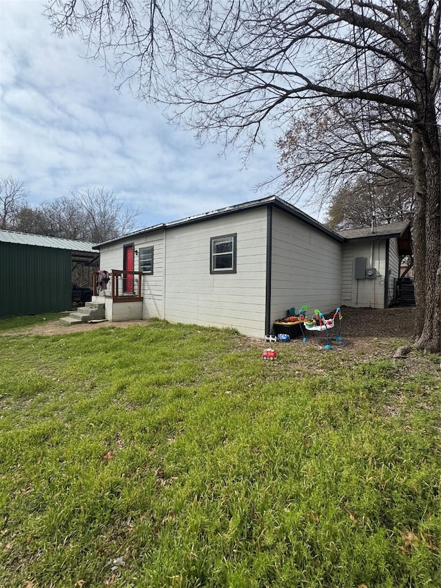 exterior space with a yard