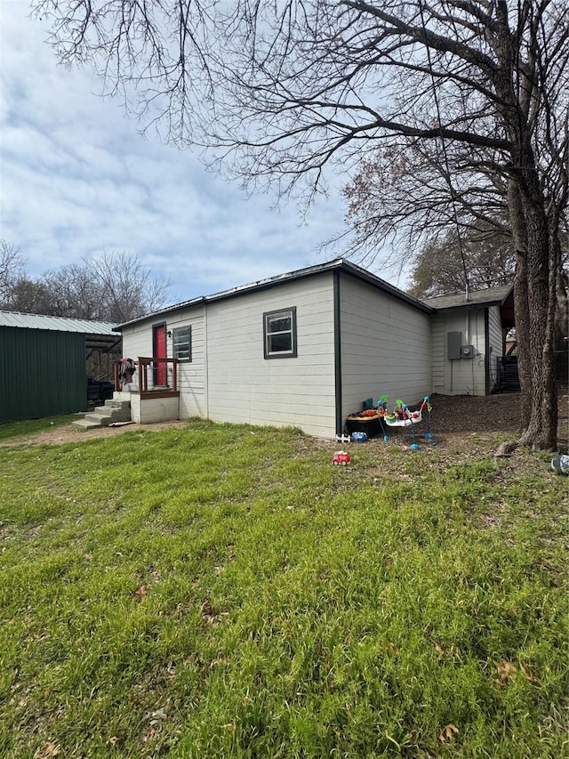 exterior space with a lawn