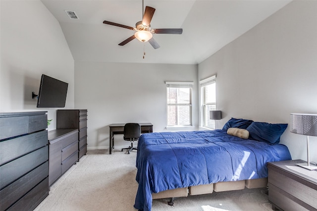 bedroom with visible vents, light carpet, baseboards, and ceiling fan