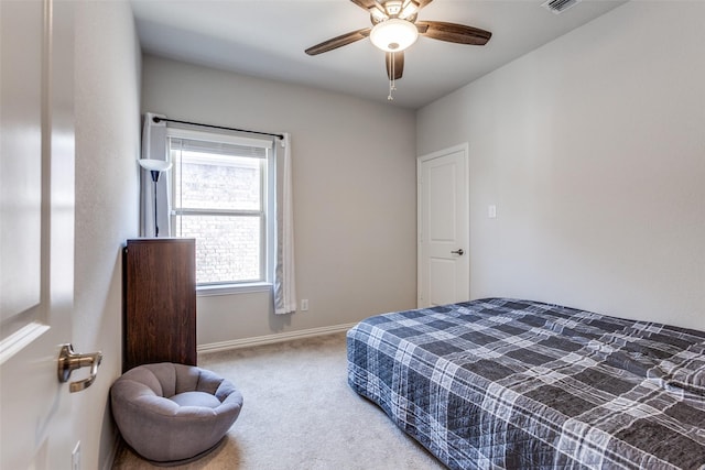 bedroom with a ceiling fan, visible vents, carpet, and baseboards