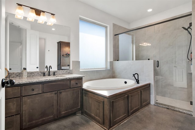 bathroom featuring a garden tub, recessed lighting, a shower stall, vanity, and concrete floors