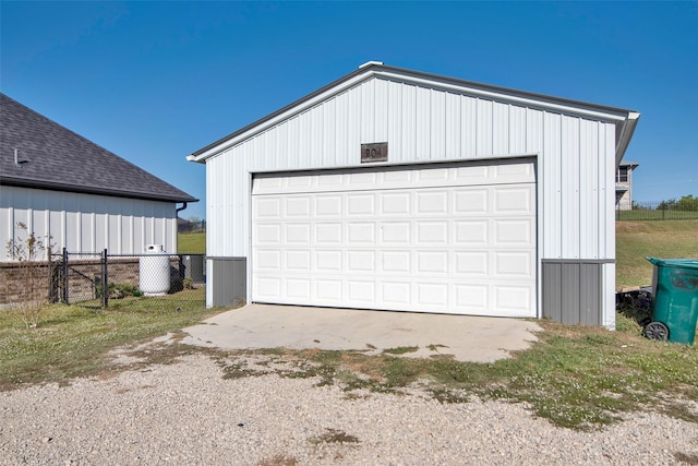 detached garage with fence