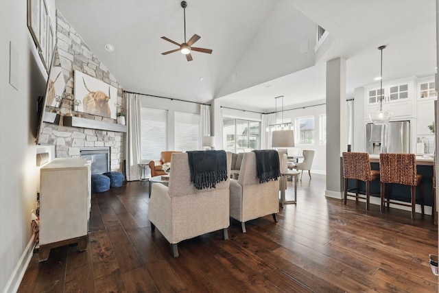 2813 Carrington Dr, Mansfield, TX 76063 - living area with a fireplace, ceiling fan, dark wood finished floors, and baseboards