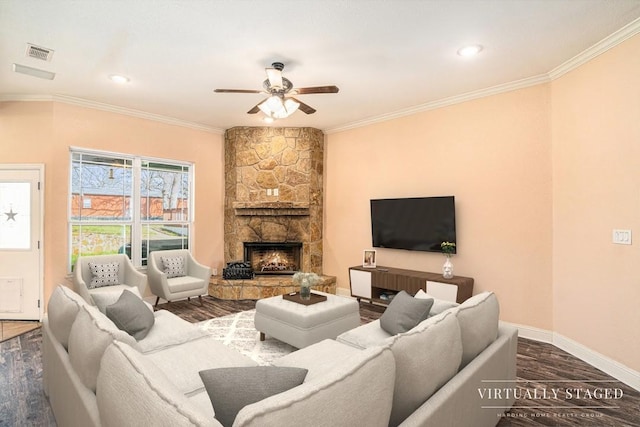 136 Clara Lee Ln, Springtown, TX 76082 - living area with a ceiling fan, dark wood finished floors, crown molding, baseboards, and a fireplace