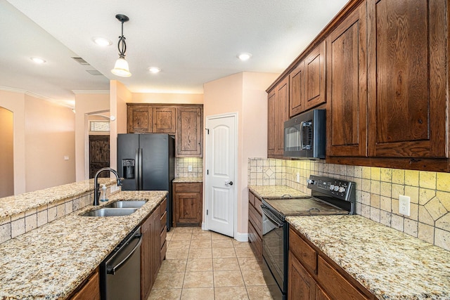 136 Clara Lee Ln, Springtown, TX 76082 - kitchen with black appliances, a sink, decorative backsplash, decorative light fixtures, and crown molding