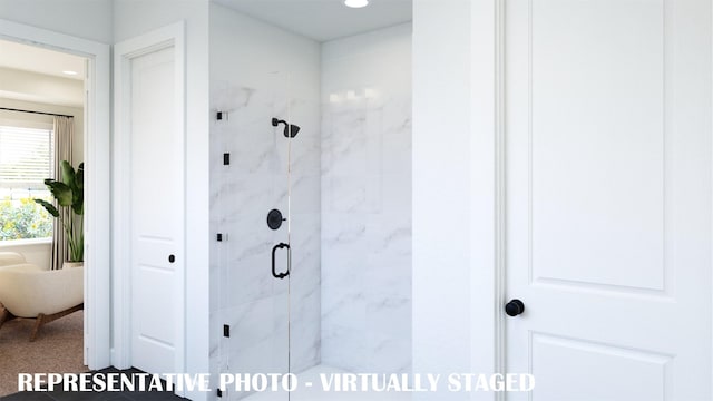 full bathroom with a shower stall and recessed lighting