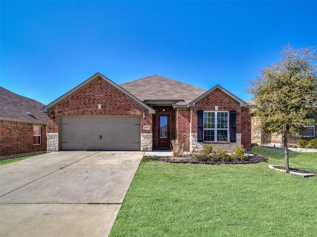 single story home featuring a garage, a shingled roof, brick siding, concrete driveway, and a front lawn