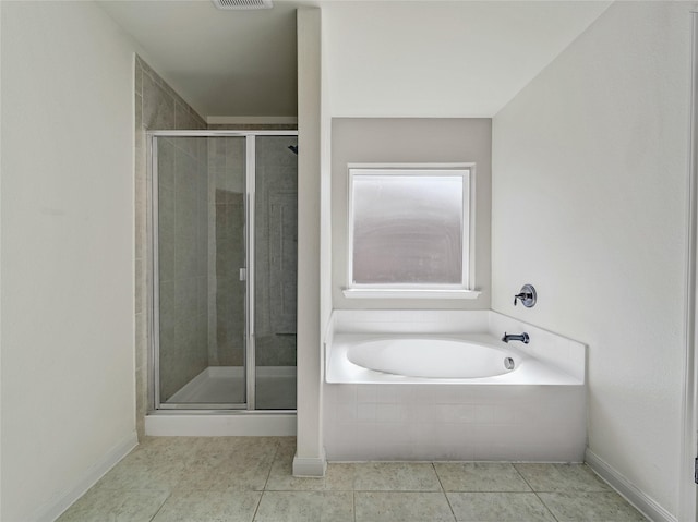 full bath with a stall shower, visible vents, baseboards, a garden tub, and tile patterned flooring