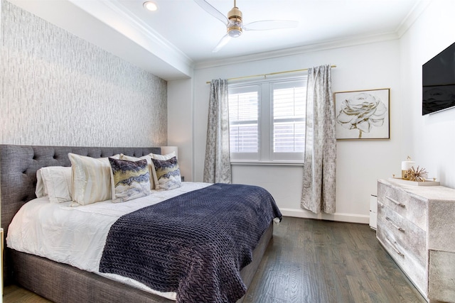 bedroom with ornamental molding, ceiling fan, baseboards, and wood finished floors