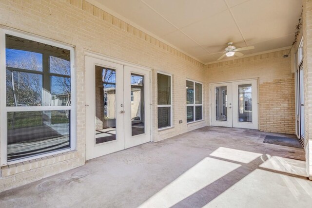 exterior space with french doors and ceiling fan