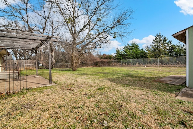 view of yard featuring a patio area, a fenced backyard, and a pergola