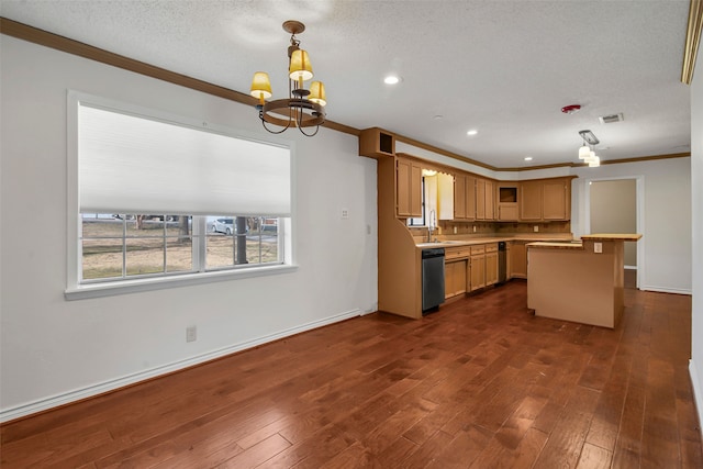 kitchen with dark wood-style flooring, a sink, visible vents, dishwasher, and crown molding