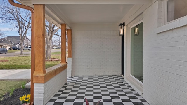 view of patio / terrace with covered porch and a residential view