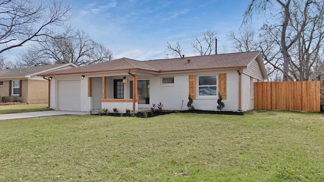 single story home with driveway, brick siding, an attached garage, fence, and a front yard