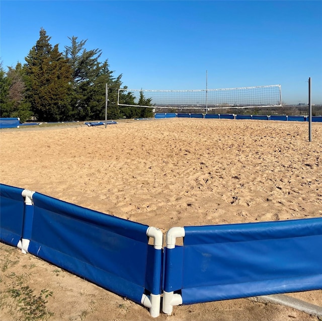 surrounding community featuring volleyball court