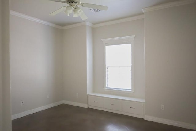 empty room featuring a ceiling fan, visible vents, crown molding, and baseboards