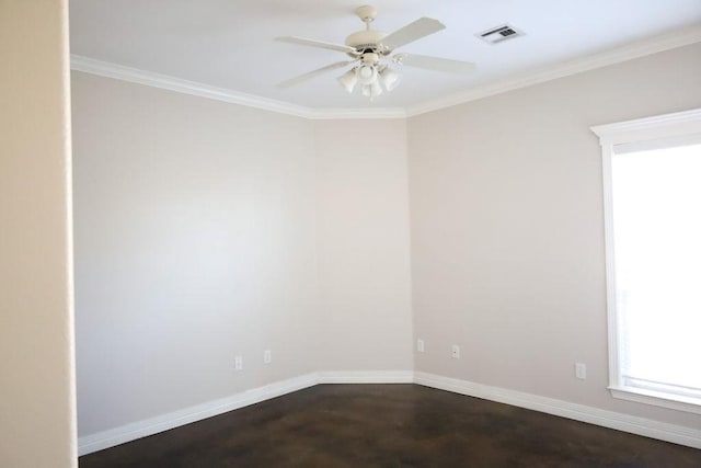 empty room featuring ornamental molding, visible vents, ceiling fan, and baseboards