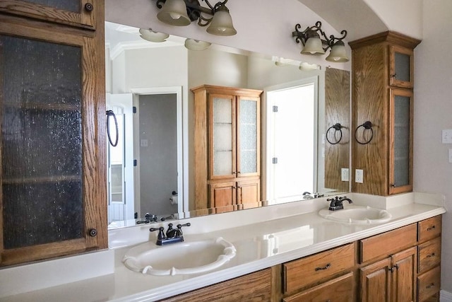 bathroom with double vanity and a sink