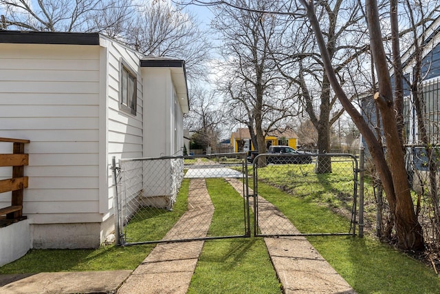 view of yard with a gate and fence