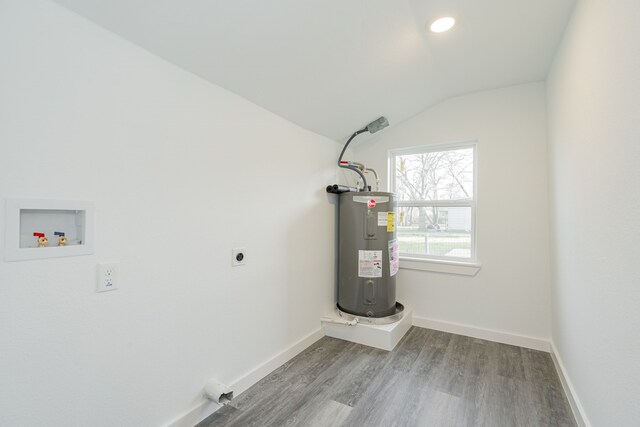 utility room featuring water heater