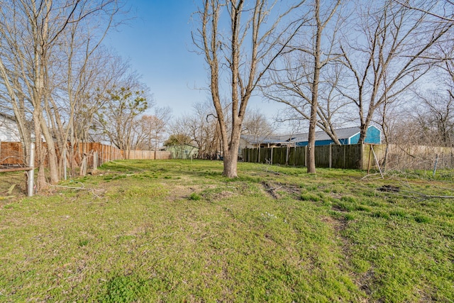 view of yard with fence