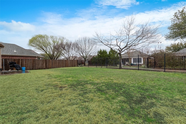 view of yard with fence