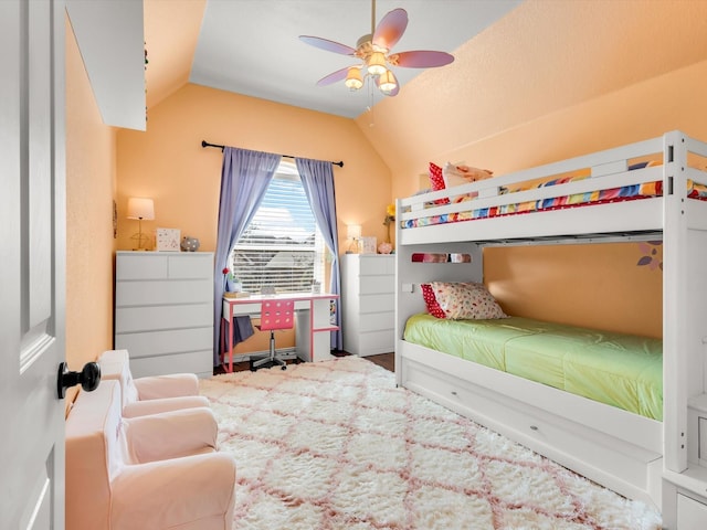 bedroom featuring ceiling fan and vaulted ceiling