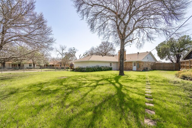 view of yard featuring fence