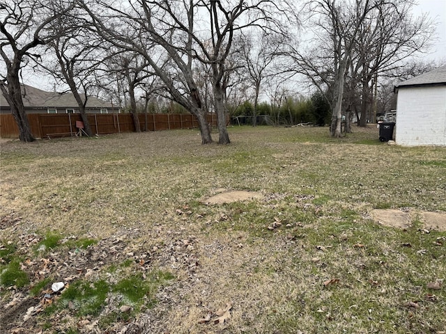 view of yard featuring fence