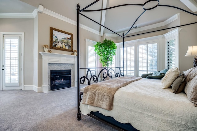 5340 Jessica Ln, Frisco, TX 75034 - carpeted bedroom featuring a glass covered fireplace, ornamental molding, and lofted ceiling