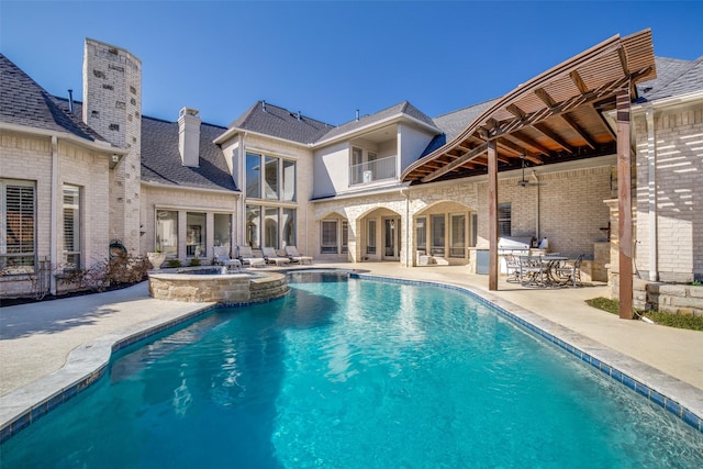 5340 Jessica Ln, Frisco, TX 75034 - view of swimming pool featuring a patio area and a pool with connected hot tub