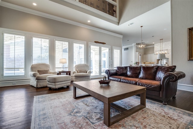 5340 Jessica Ln, Frisco, TX 75034 - living area featuring a chandelier, wood finished floors, ornamental molding, plenty of natural light, and recessed lighting