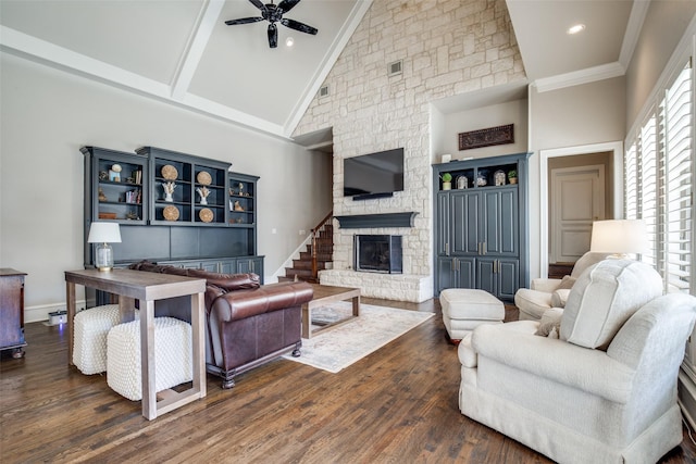 5340 Jessica Ln, Frisco, TX 75034 - living area with a ceiling fan, dark wood-type flooring, high vaulted ceiling, a fireplace, and ornamental molding