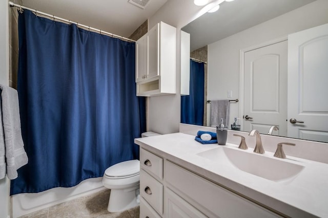 full bathroom with toilet, curtained shower, tile patterned flooring, and vanity