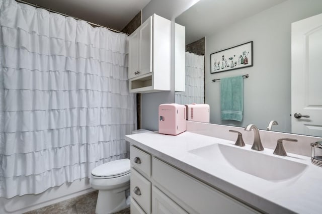 full bathroom featuring toilet and vanity