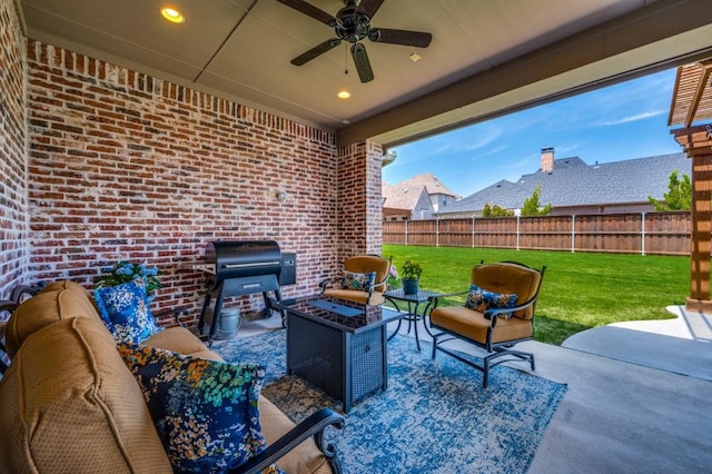 view of patio with a ceiling fan, a fenced backyard, outdoor lounge area, and grilling area