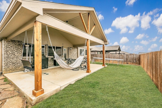 view of yard with a patio and a fenced backyard